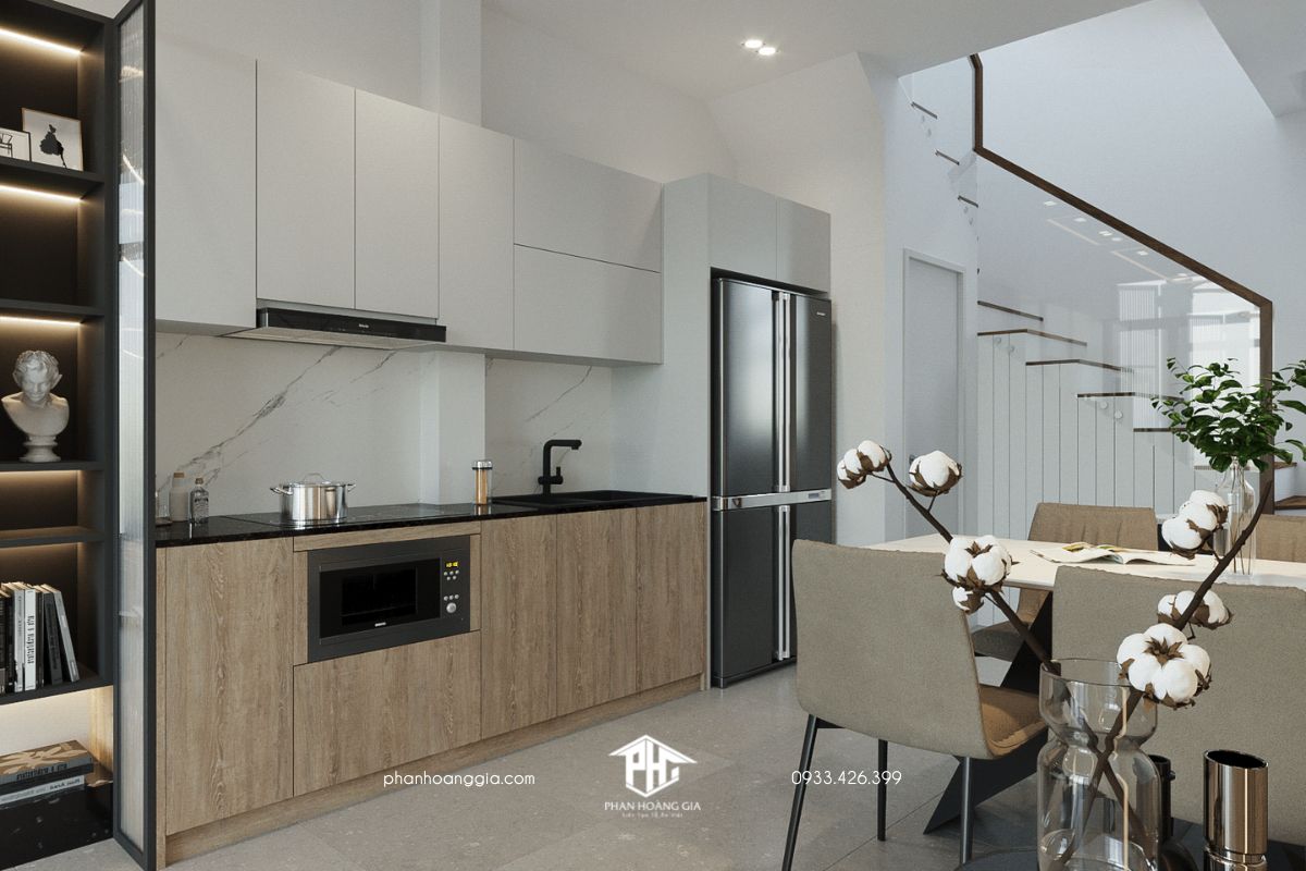 Thiết kế nội thất nhà bếp cho nhà phố với tủ bếp màu nâu và bàn ăn màu trắng